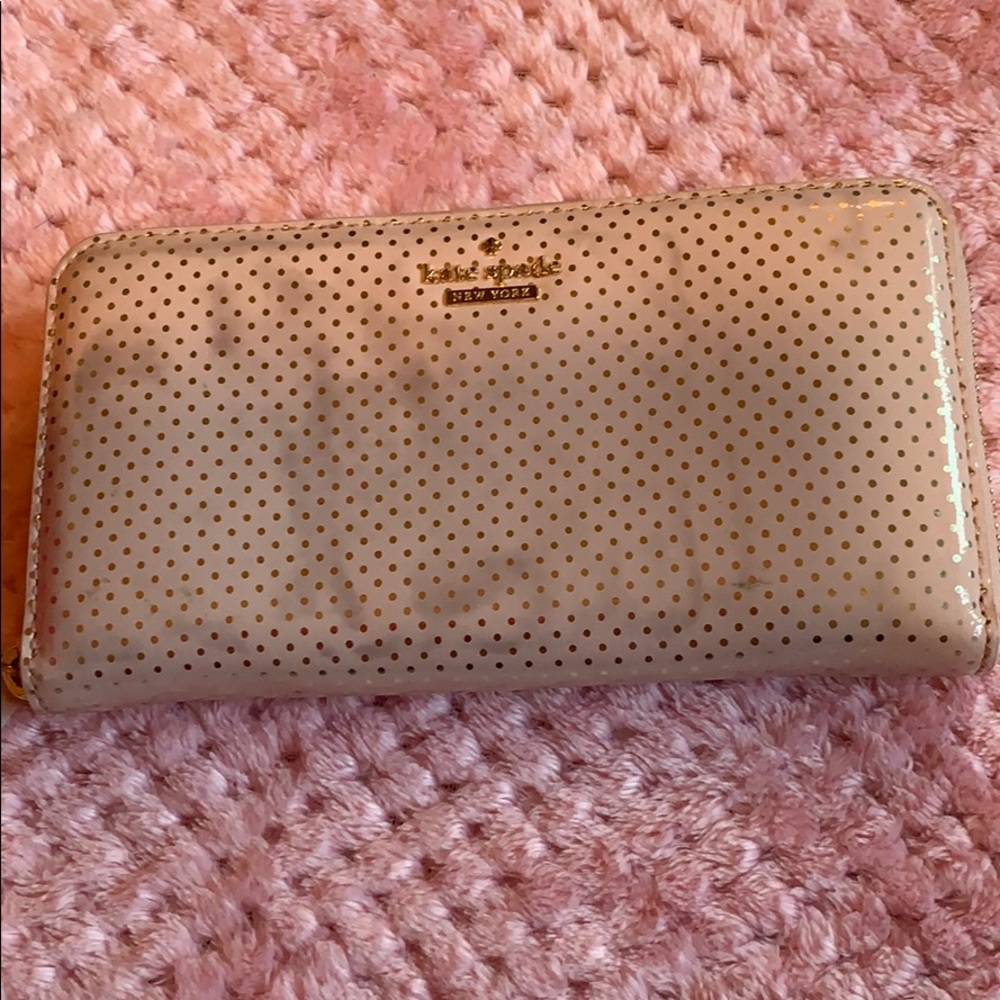Zip around Kate spade wallet.